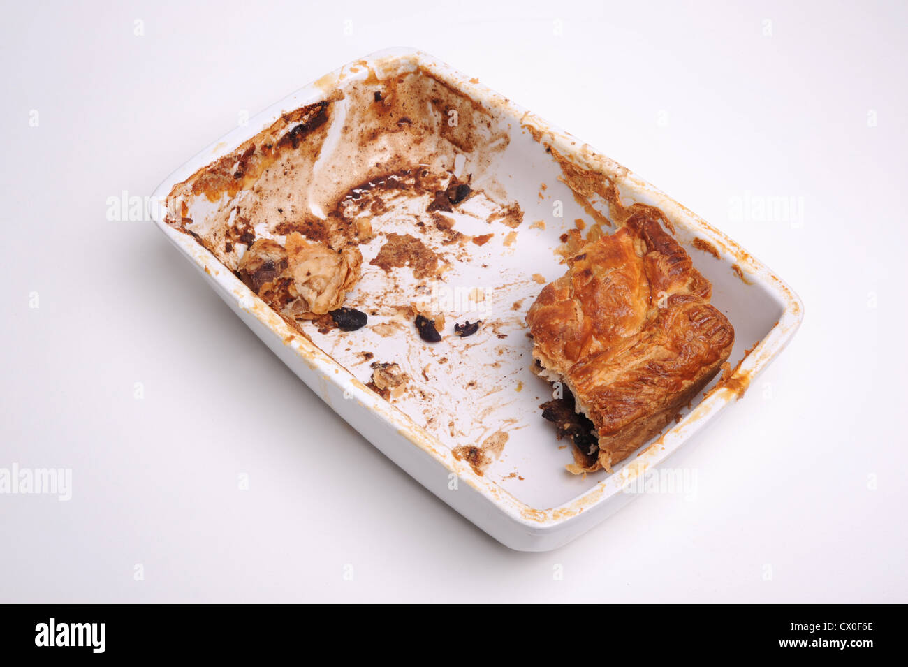 Eaten Pie in a pie dish Stock Photo - Alamy