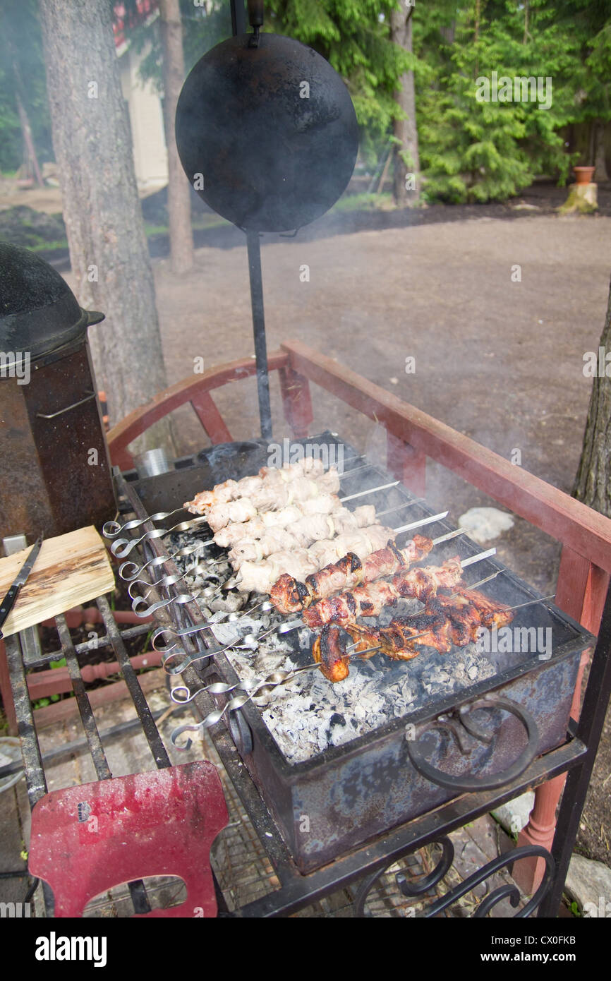 Process of cooking meat on barbecue, closeup Stock Photo Alamy