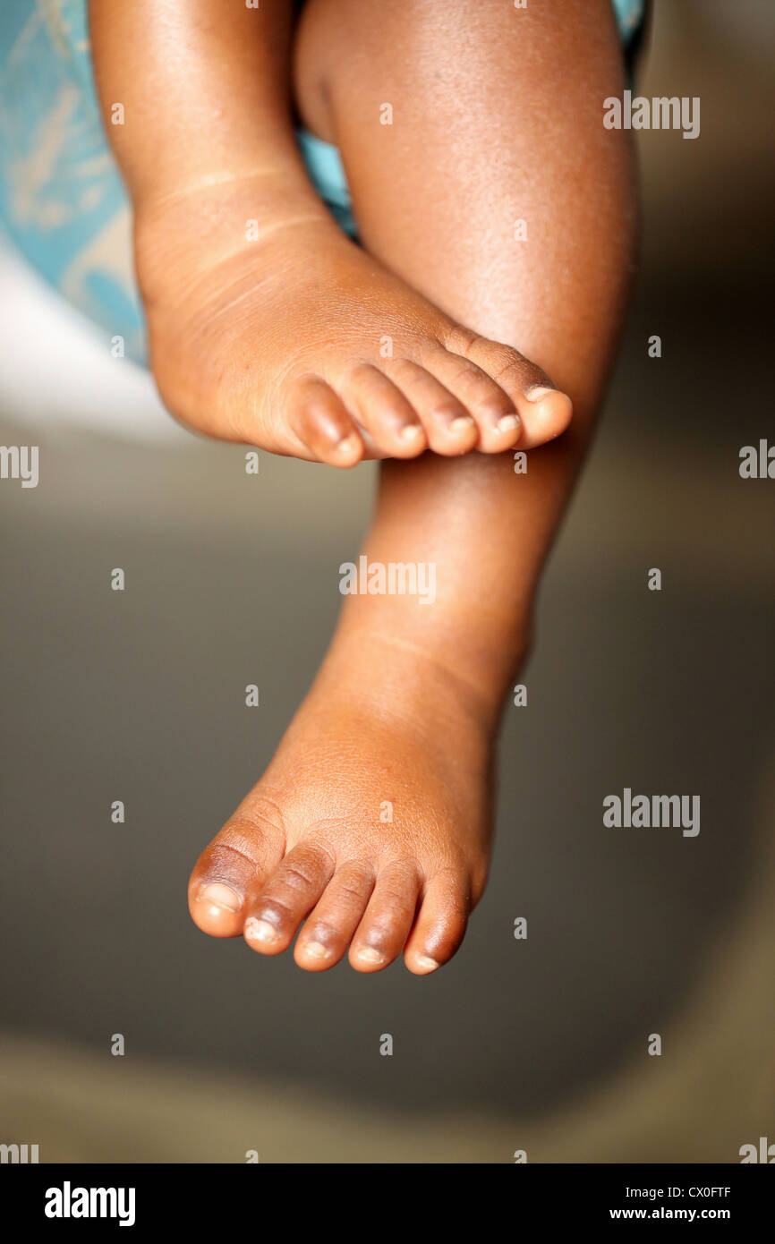 Indian small child feet sleeping Andhra Pradesh South India Stock Photo