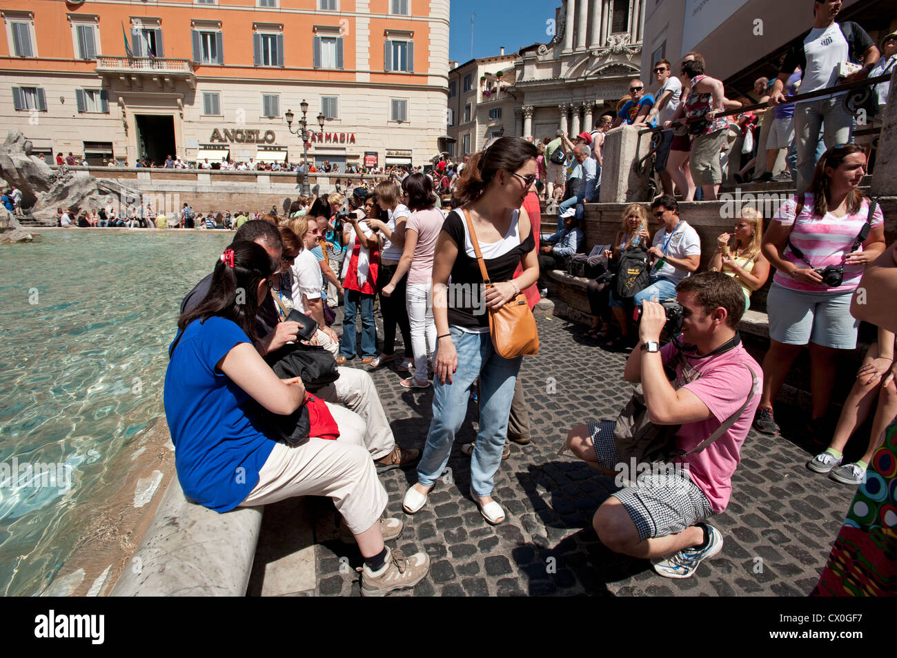 Tourists take pictures at the Trevi fountain Rome Italy Stock Photo - Alamy