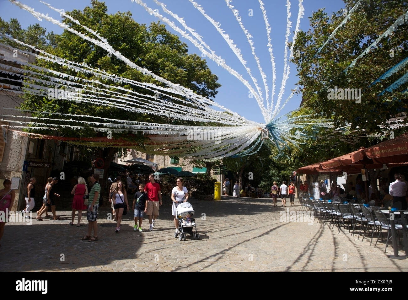 Bunting hanging in the streets of Valdemossa Mallorca (Majorca) for a festival. Stock Photo