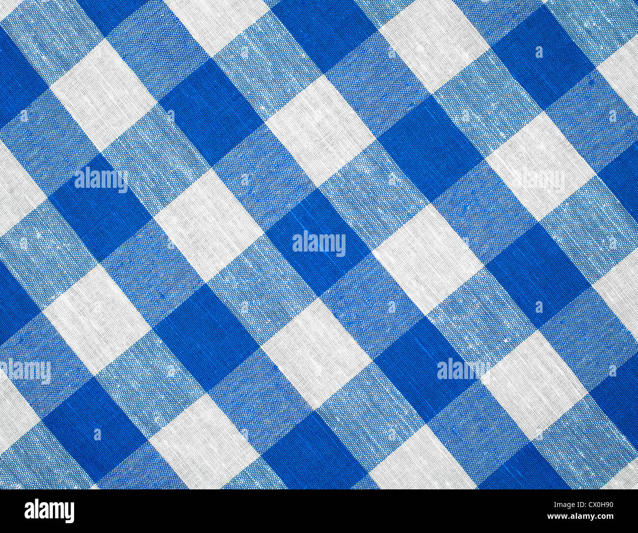 blue horizontal checked fabric tablecloth Stock Photo