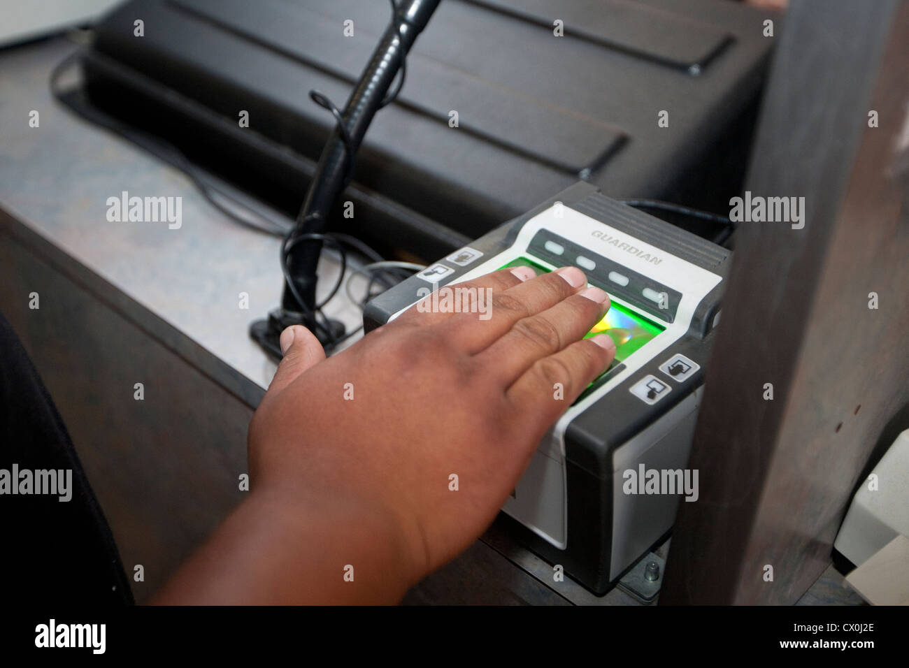 US Customs and Border Protection officer uses scanner to document and