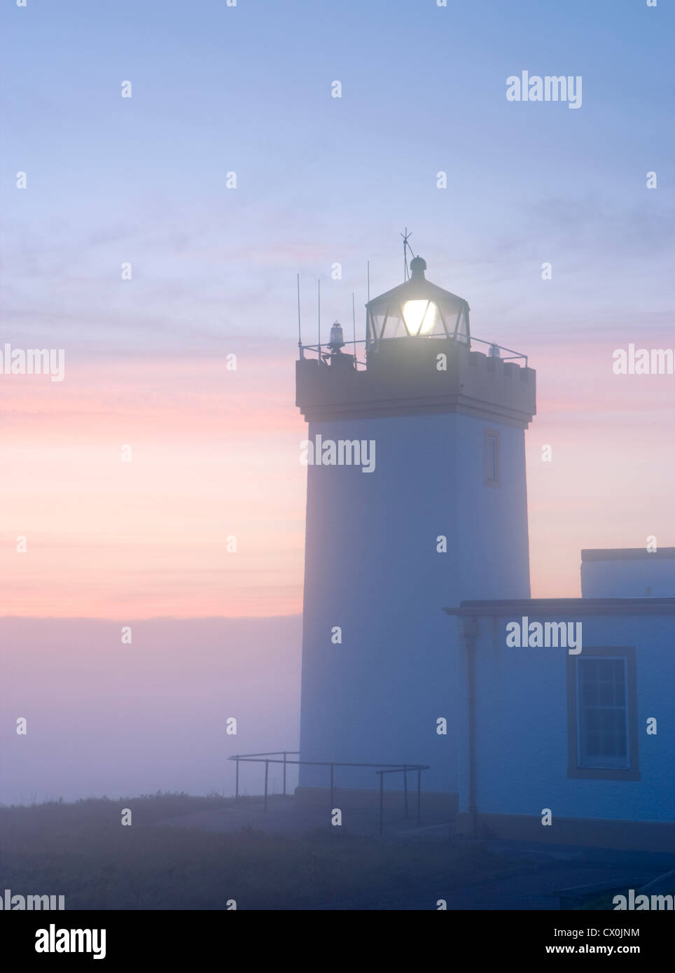 Duncansby Head lighthouse at dawn, near John o' Groats, Highland, Scotland, UK. Stock Photo