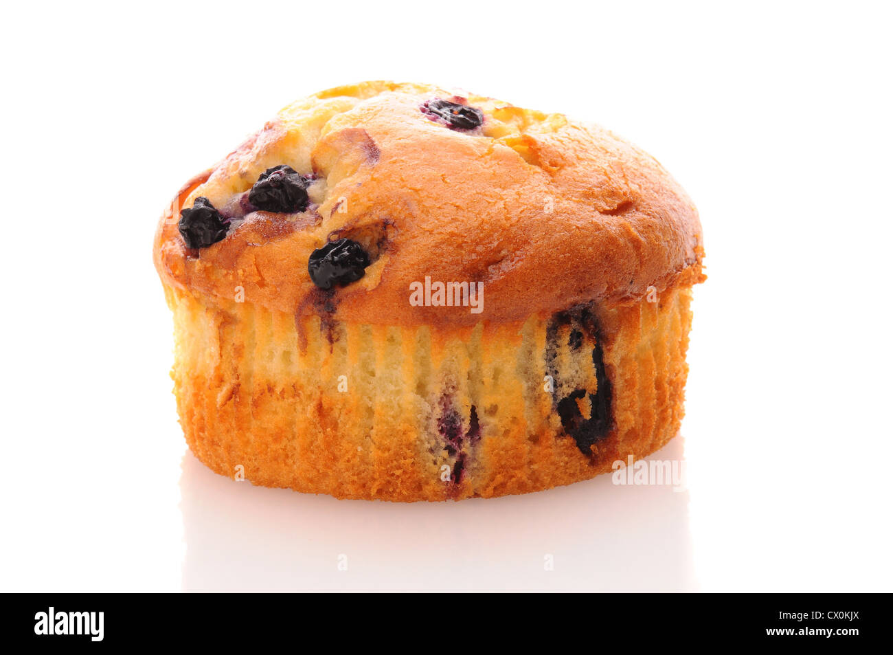 Closeup of a Blueberry Muffin on a white surface with reflection. Stock Photo
