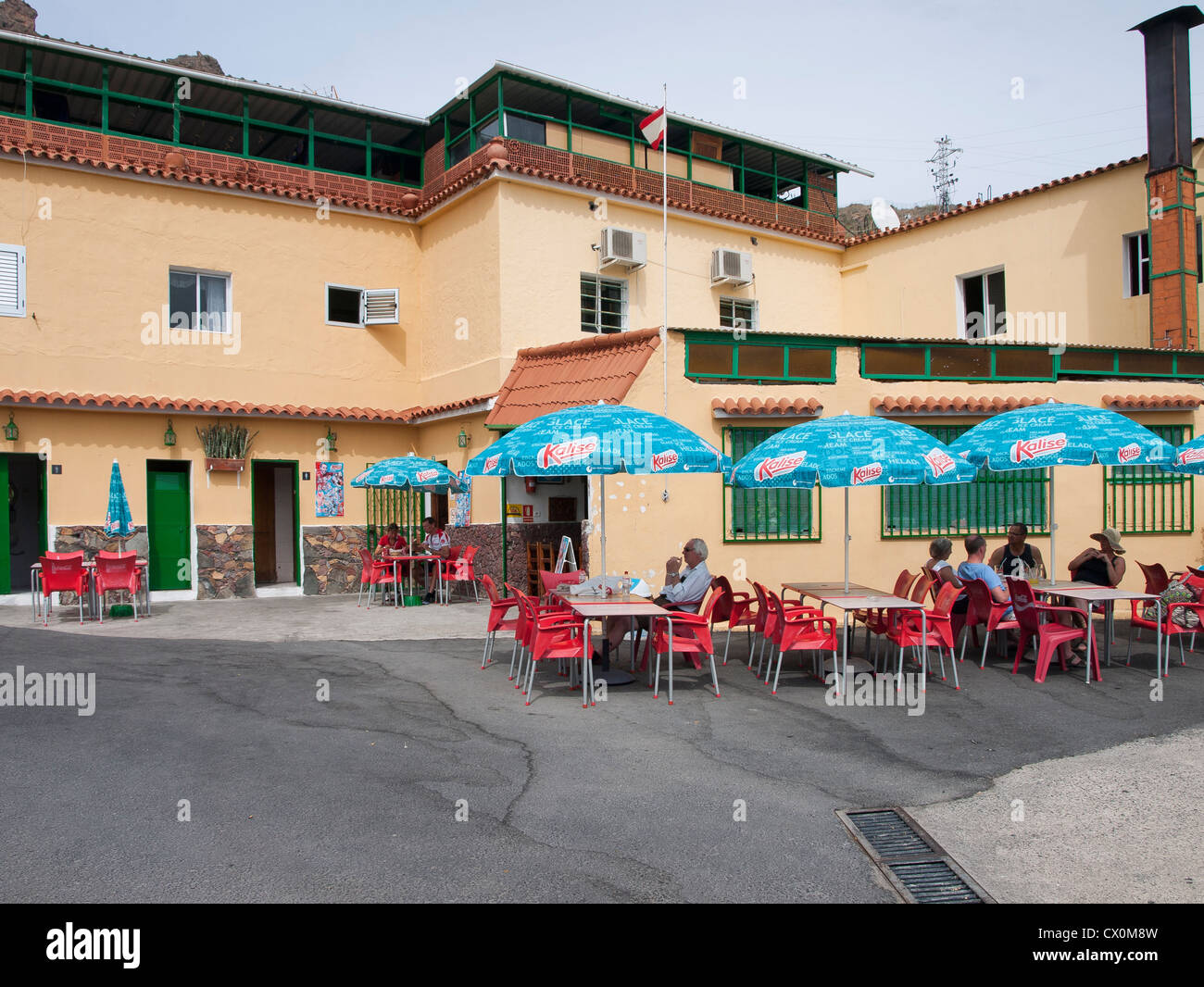 A restaurant in Soria village Gran Canaria offers shade under the umbrellas and local dishes on the menu Stock Photo
