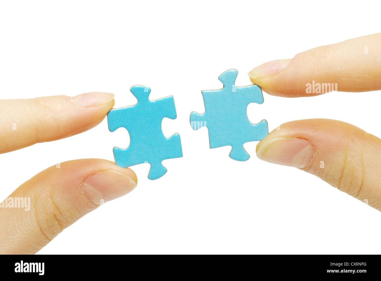 puzzle in hand isolated on white background Stock Photo - Alamy