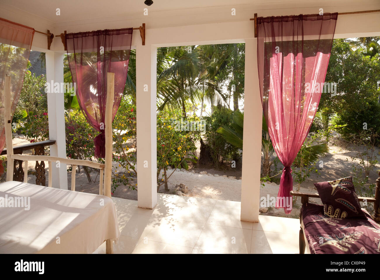 Veranda of a guest room in the Luxury boutique Echo Beach Hotel, Bwejuu,  Zanzibar Africa Stock Photo - Alamy