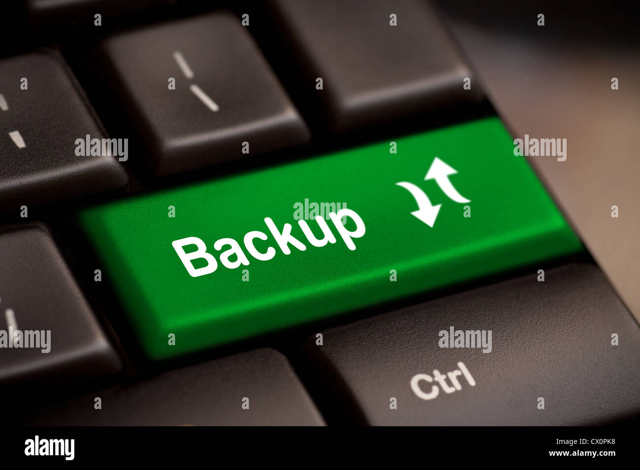 Backup Computer Key In Green For Archiving And Storage Stock Photo