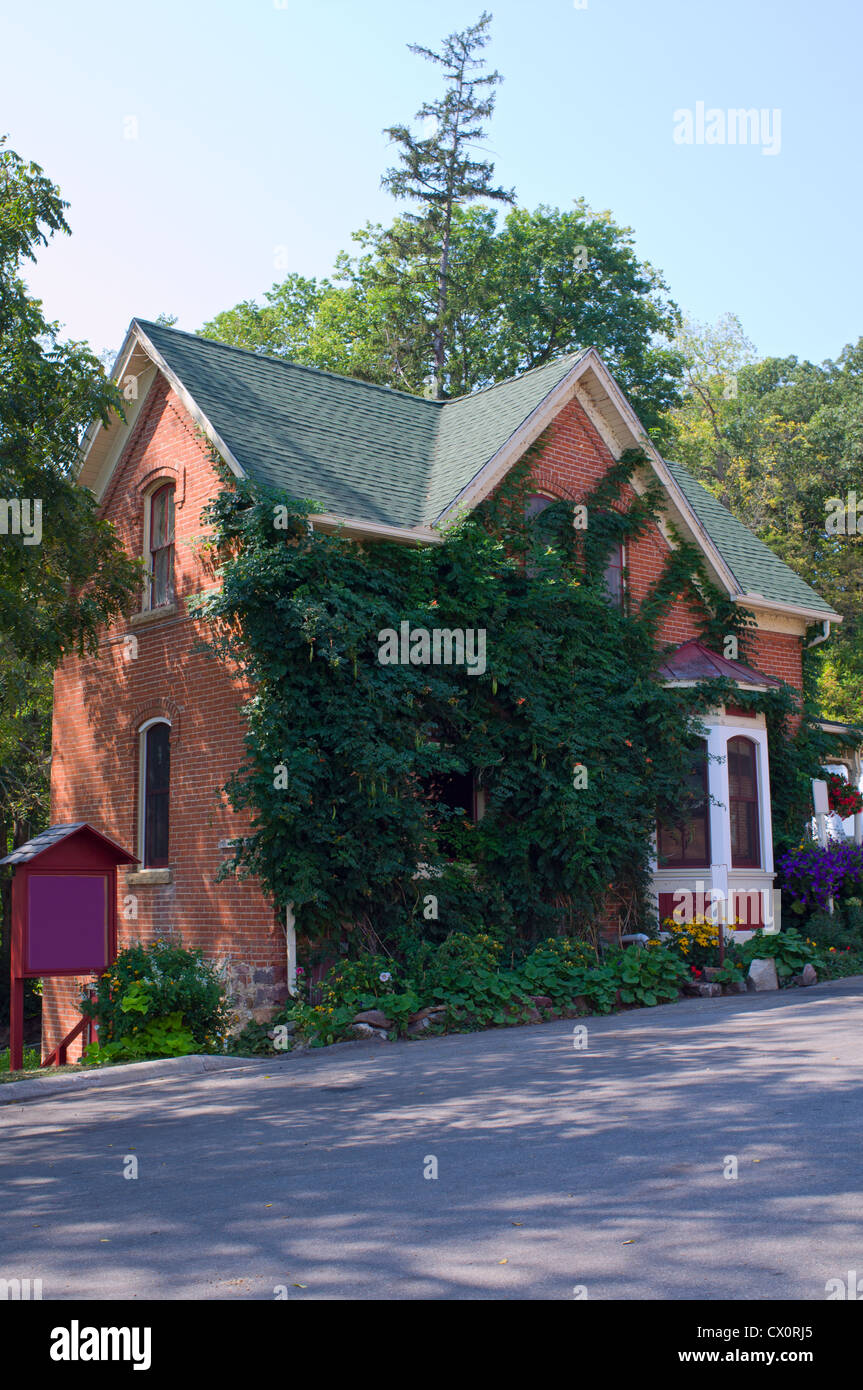 Ivy covered gift shop building on grounds of brewery in New Ulm