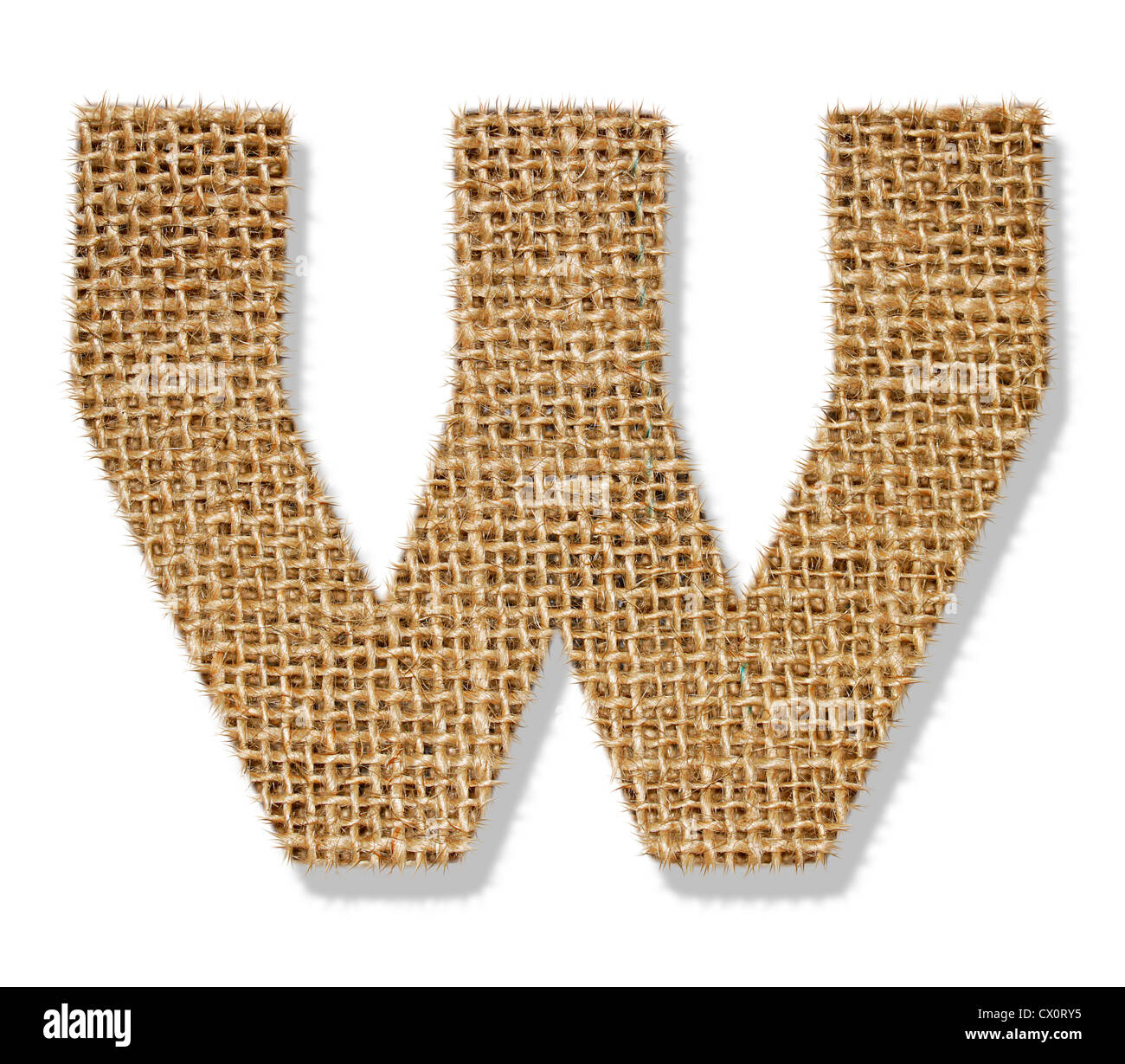 The letter 'W' is made of coarse cloth. Stock Photo
