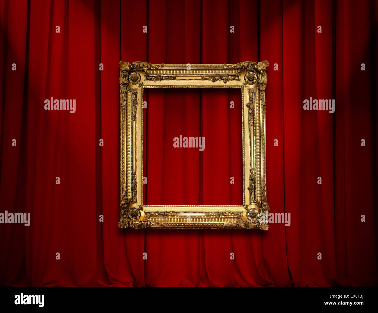 Empty golden painting frame on red curtain wall Stock Photo Alamy