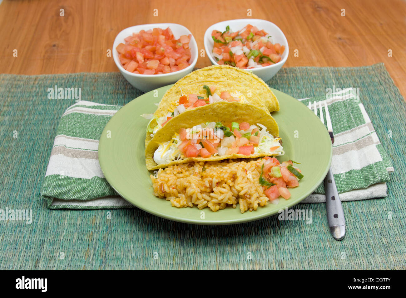 three taco mexican dinner with rice Stock Photo