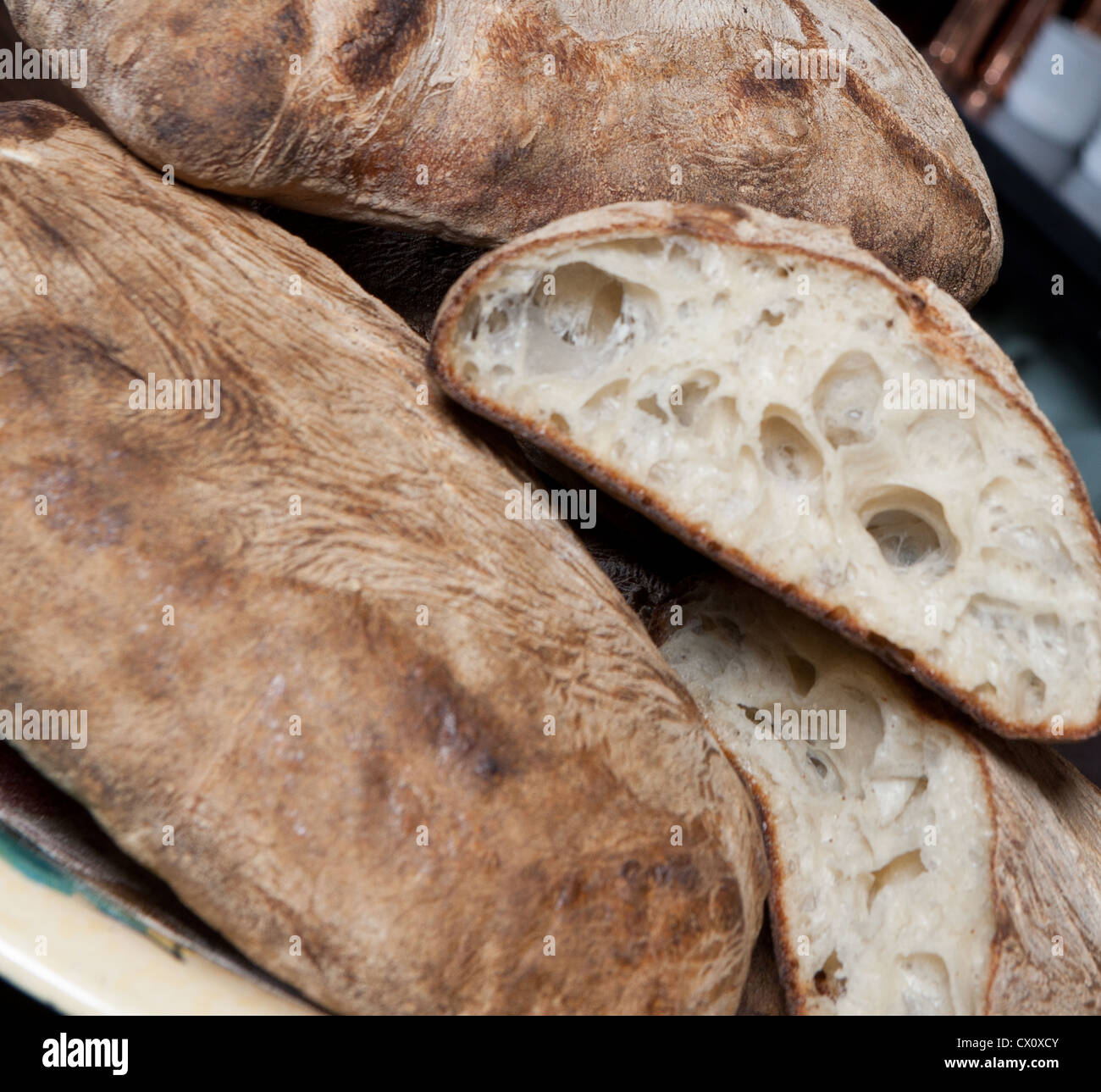 Color photograph of brick oven baked bread Stock Photo - Alamy