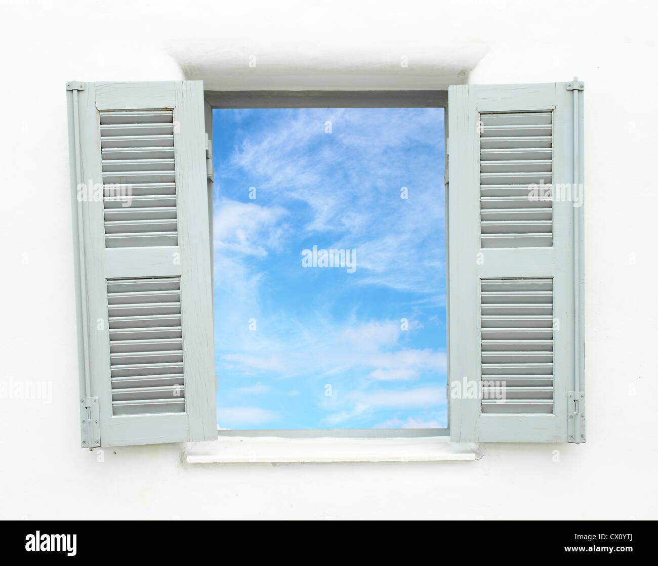 Greek Style windows with blue sky view Stock Photo