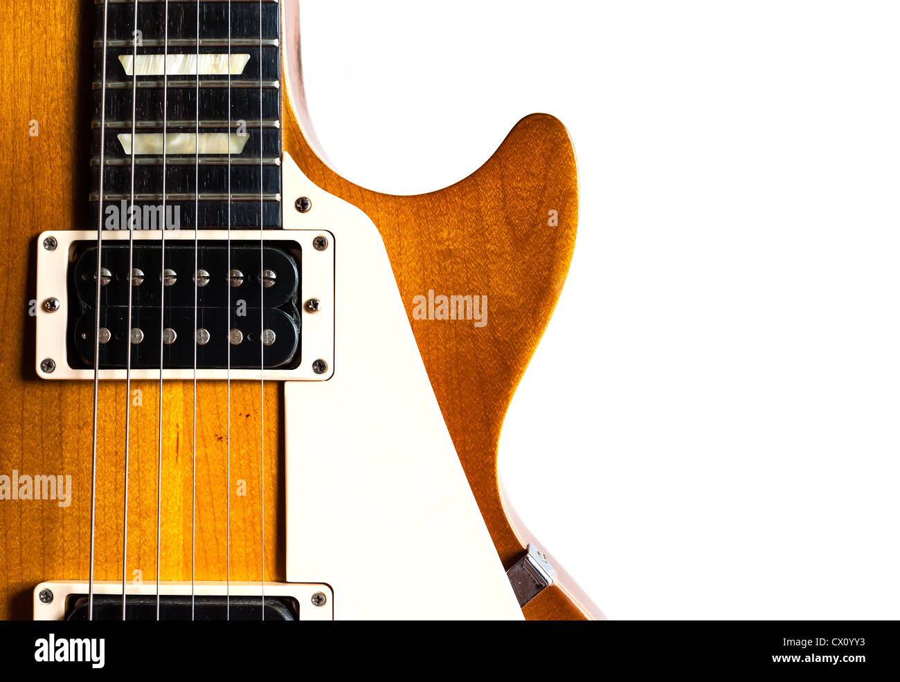 Old electric guitar humbucker pickup honey burst color on white background isolate Stock Photo