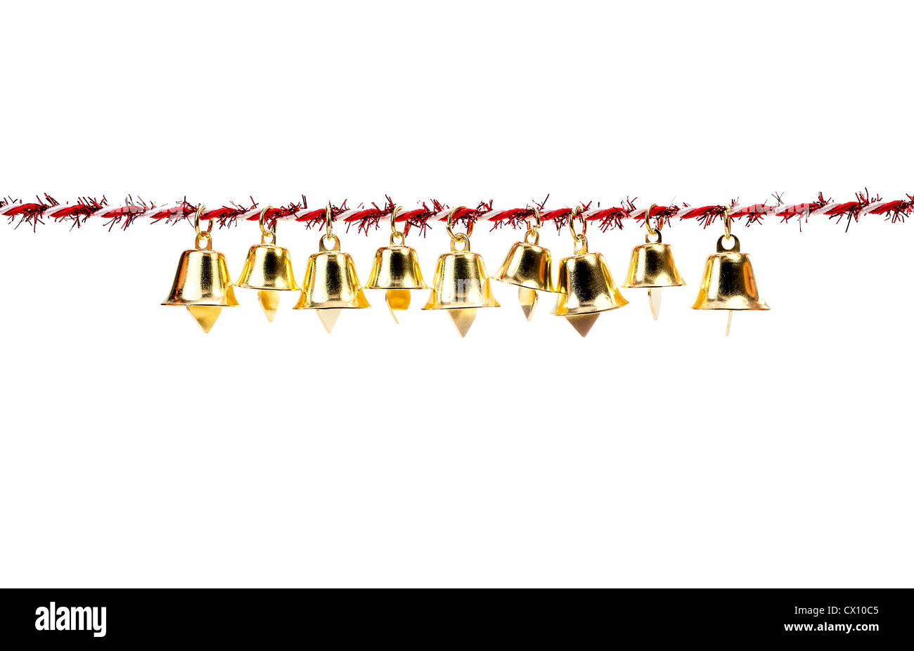 Real Bells With Ribbons Golden bell holding ribbon rope isolate on white background Stock Photo ...