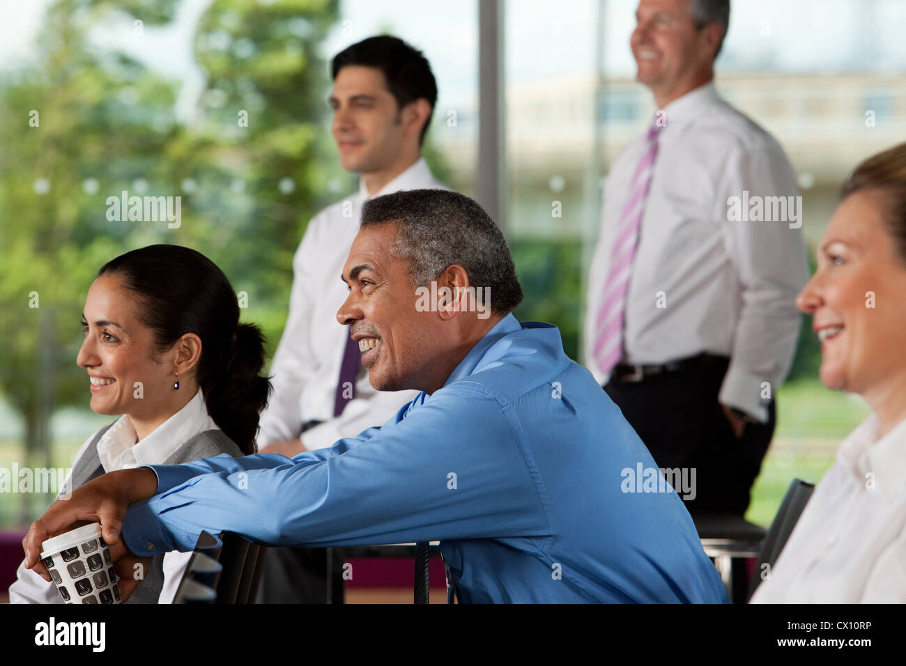 Businesspeople at presentation Stock Photo