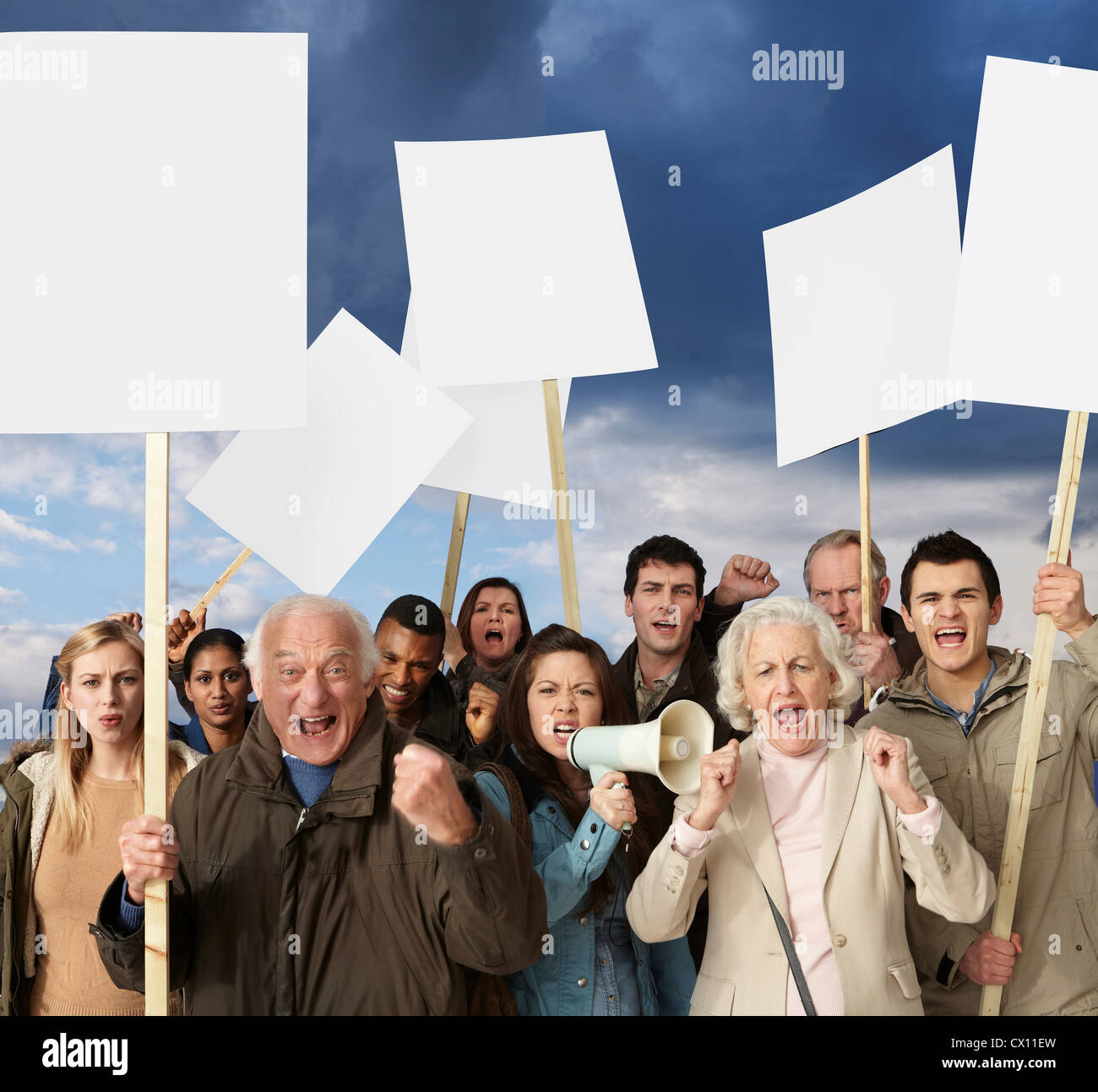 Group of angry protesters holding blank banners Stock Photo