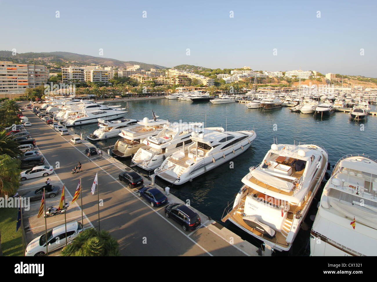 Puerto Portals Marina at late afternoon - luxury superyachts + restaurants + boutiques - Calvia, South West Mallorca / Majorca Stock Photo