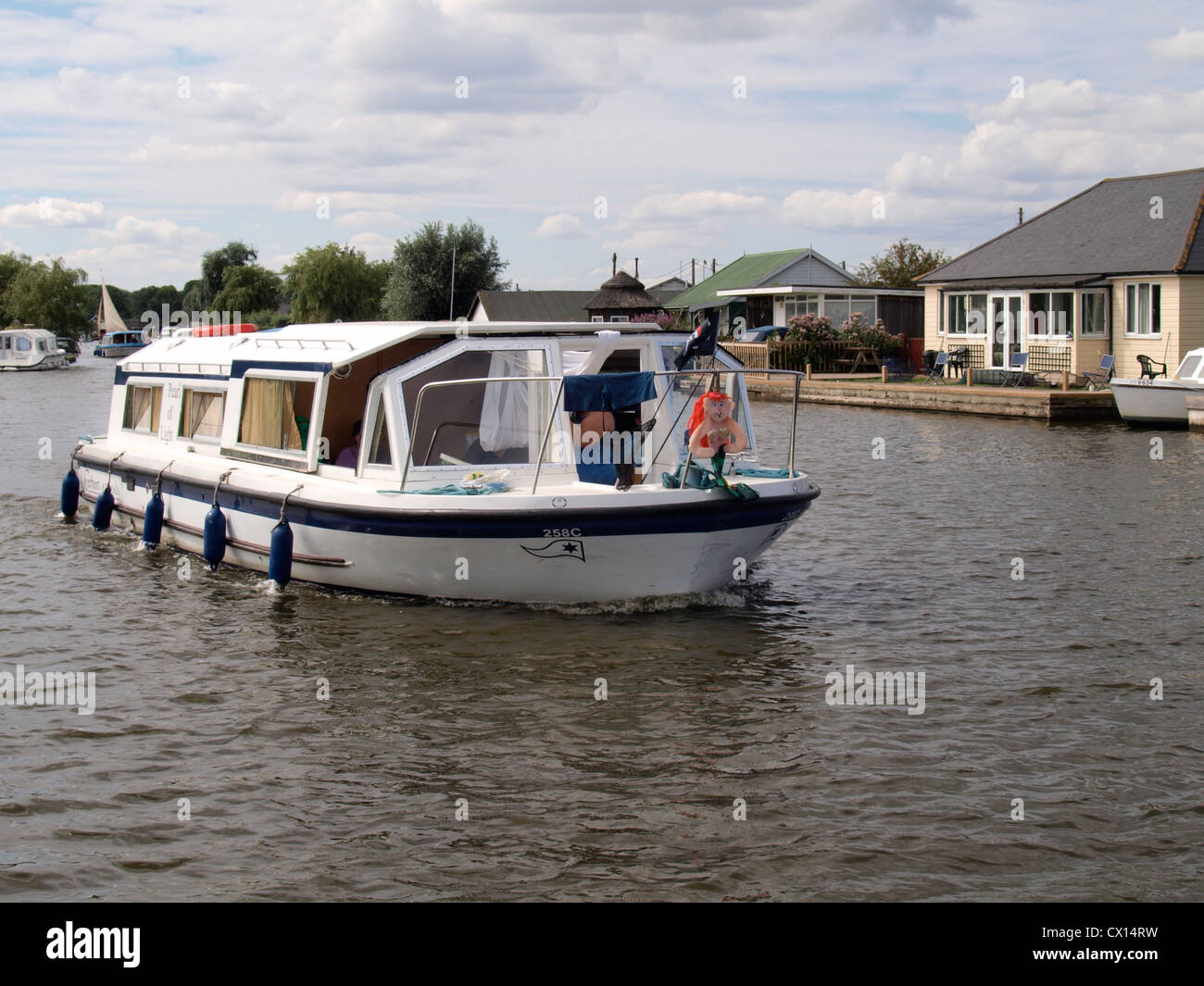 Norfolk Broads cruiser on the River Thurne, UK Stock Photo