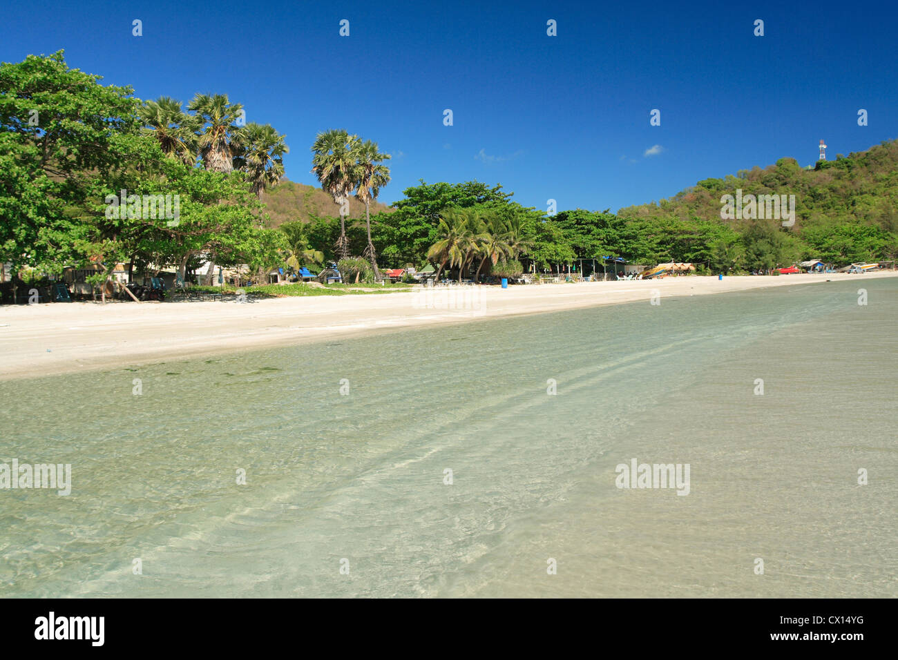 Clear water and white sand beach in daytime , Thailand. Stock Photo