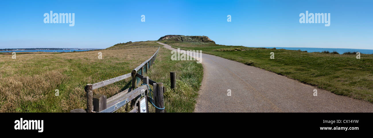A walking path on Hengistbury Head, between the cities of Christchurch & Bournemouth in Dorset, England, with Warren Hill. Stock Photo