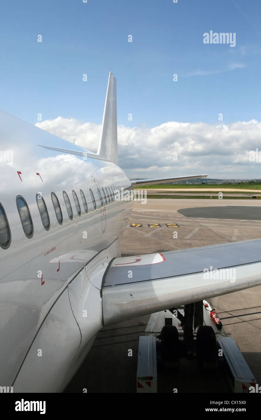 plane parked at the airport Stock Photo - Alamy