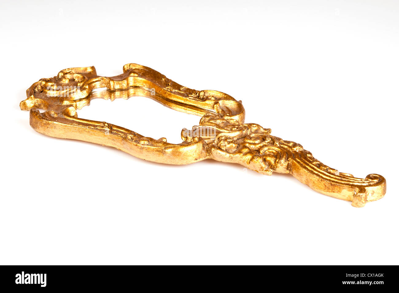 a golden decorated rococo' hand mirror Stock Photo - Alamy