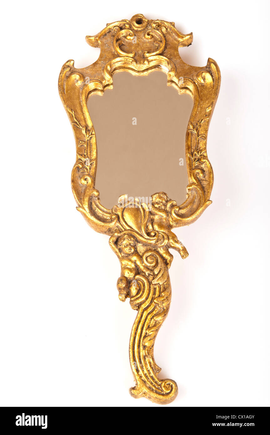 a golden decorated rococo' hand mirror Stock Photo - Alamy