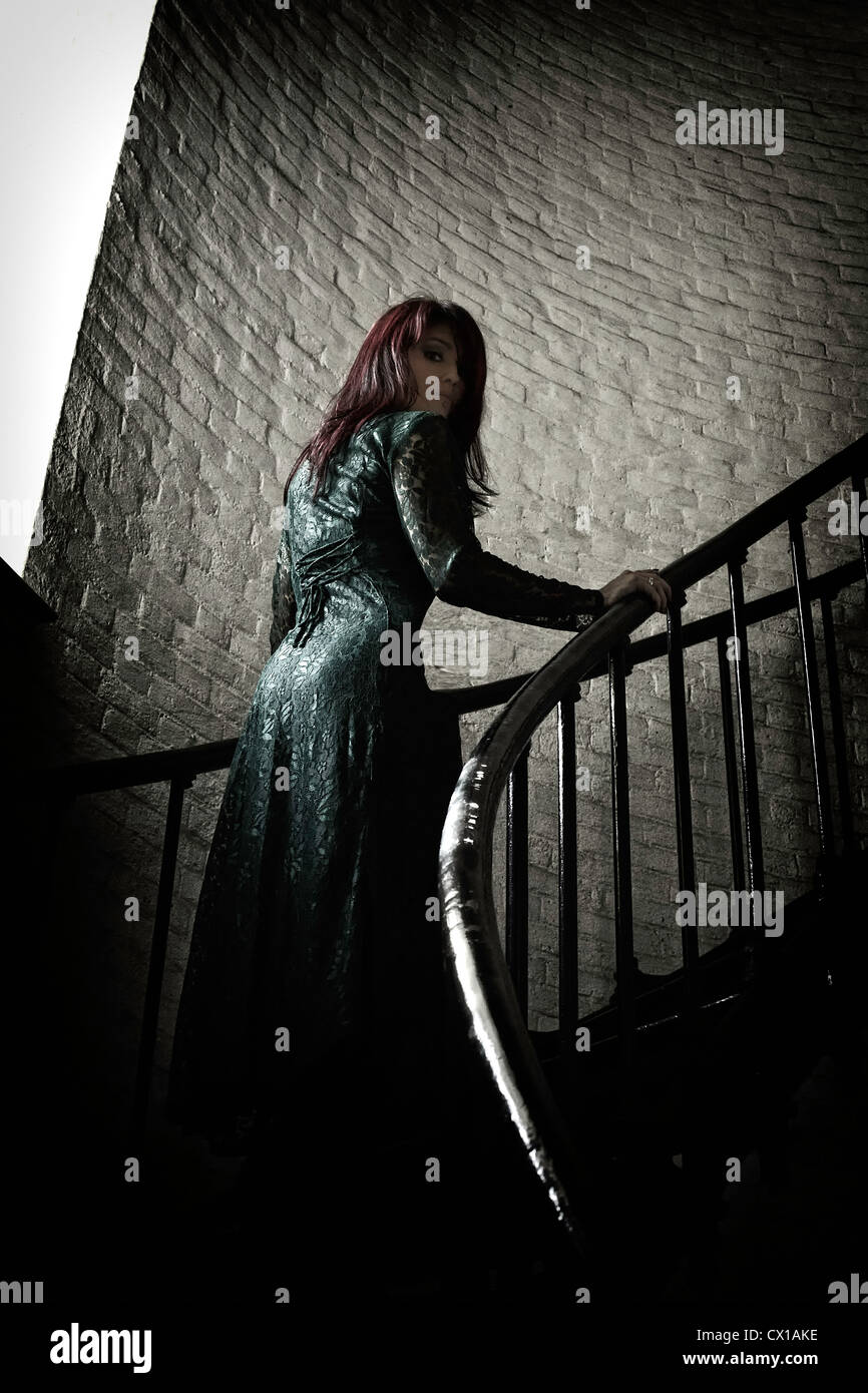 Woman climbing stairs Stock Photo Alamy