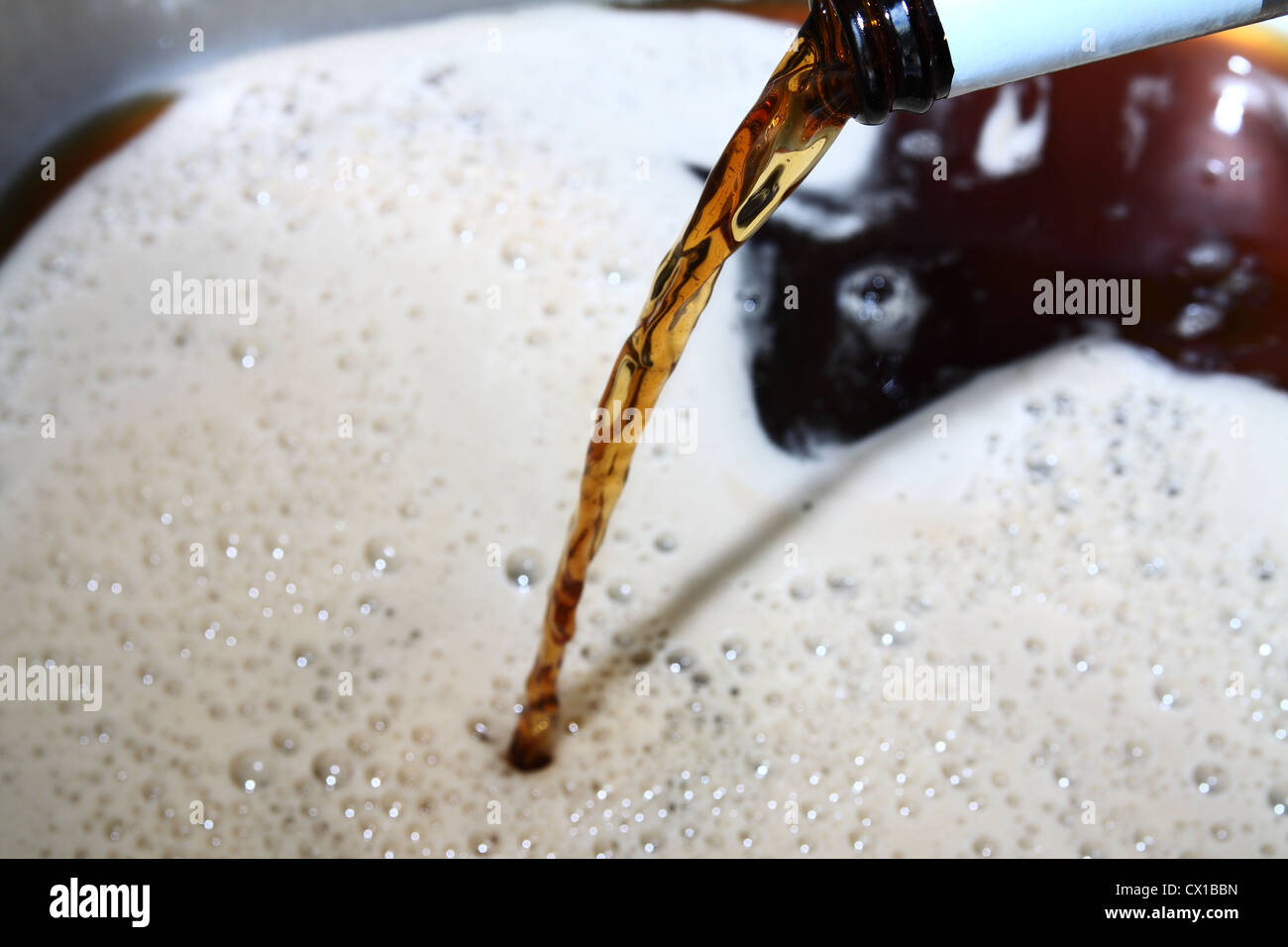 Beer being poured down the sink Stock Photo Alamy
