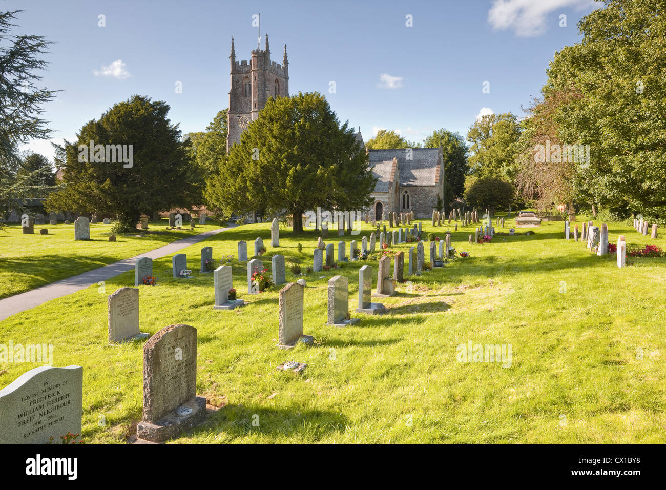 The church of St James with its graveyard in Avebury, Wiltshire. Stock Photo