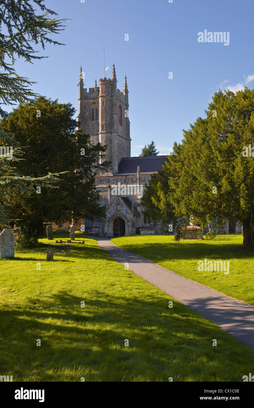 The church of St James with its graveyard in Avebury, Wiltshire. Stock Photo