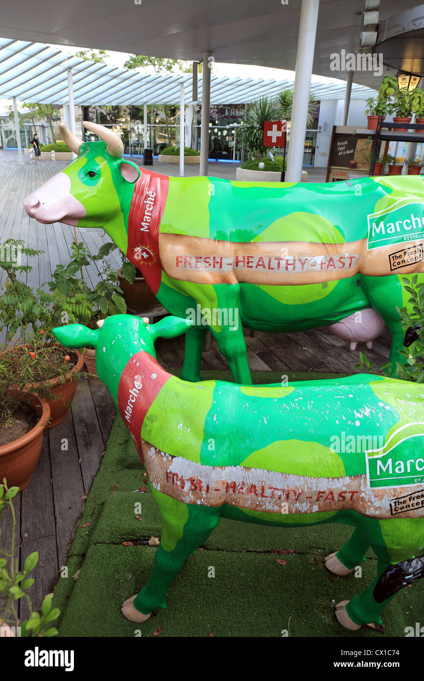 Marche Restaurant cow outside Marche Restaurant in Singapore. Stock Photo