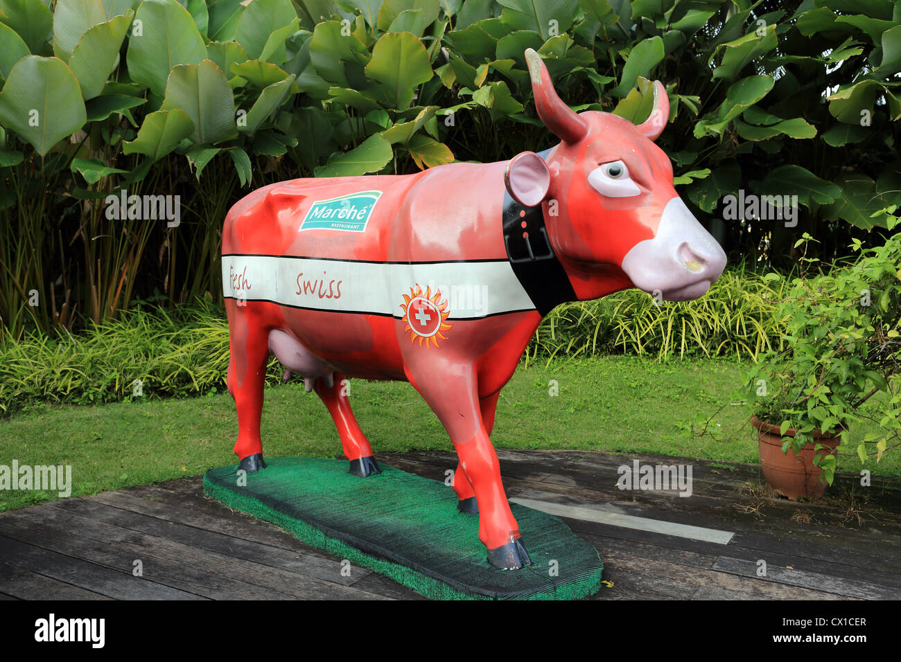 Marche Restaurant cow outside Marche Restaurant in Singapore. Stock Photo