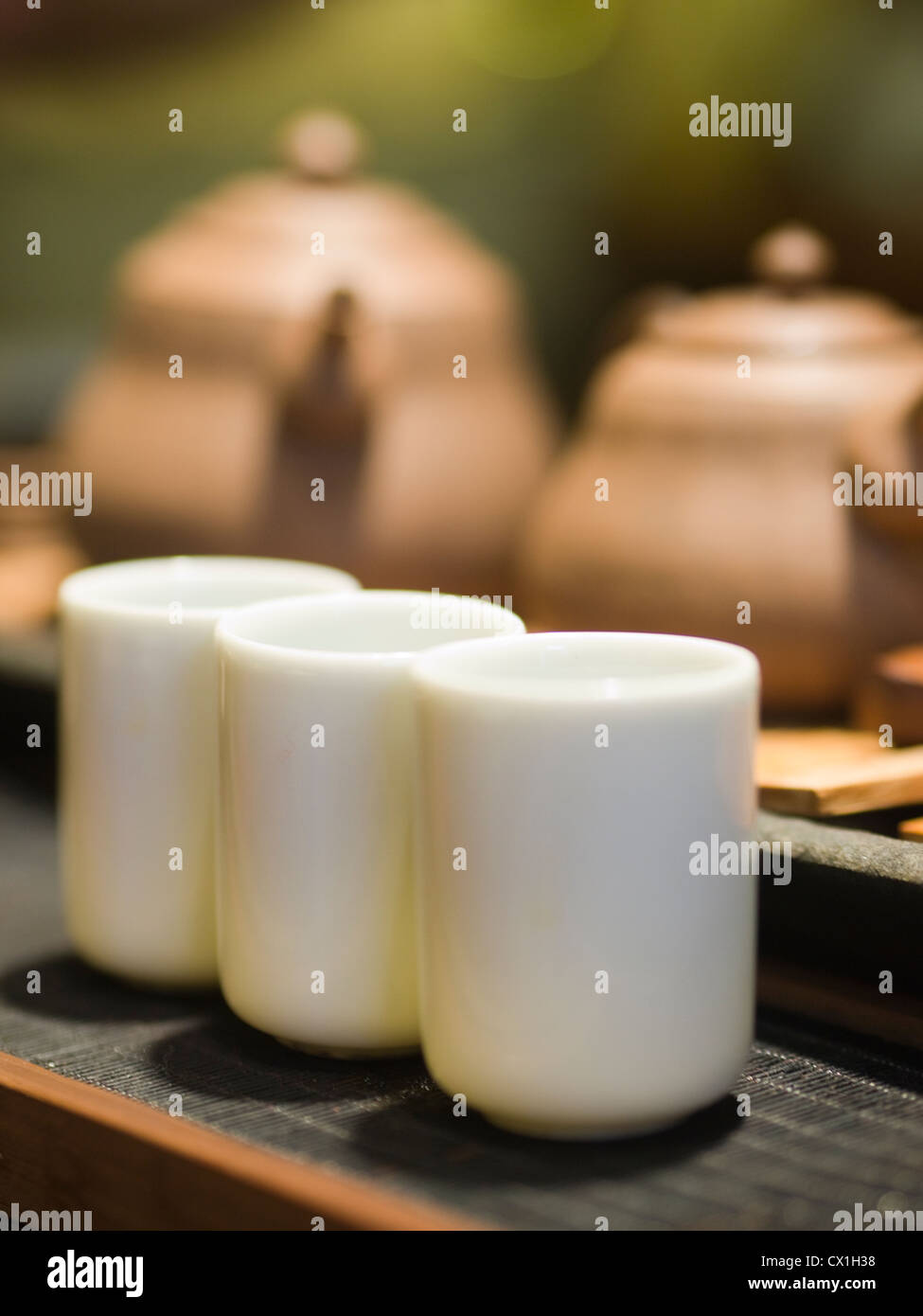 Tea cups and tea kettles in use inside a specialty Tea shop in Taipei, Taiwan Stock Photo Alamy