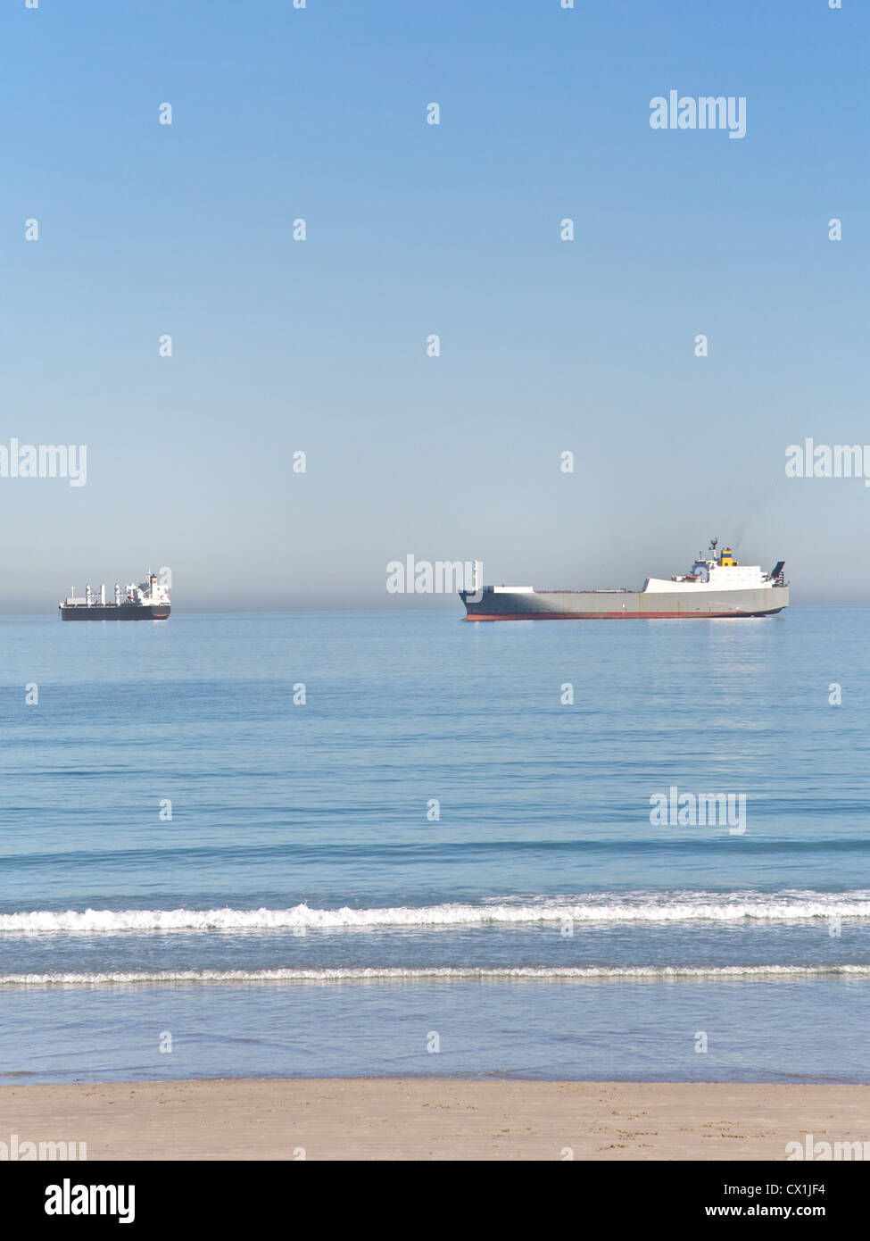 Shipping boats at sea Stock Photo