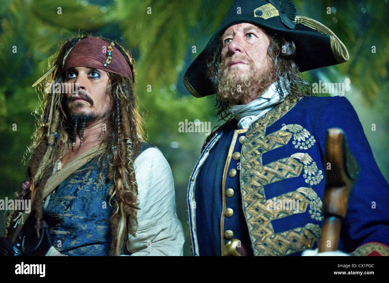 ITAR-TASS: MAY 6, 2011. Johnny Depp as Captain Jack Sparrow (L), and  Geoffrey Rush as Captain Barbossa in a scene from Rob Marshall's adventure  film Pirates of the Caribbean: On Stranger Tides. (
