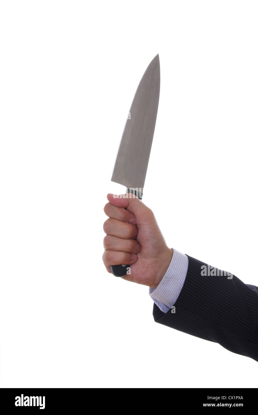 Hand of a business man holding a kitchen knife Stock Photo Alamy