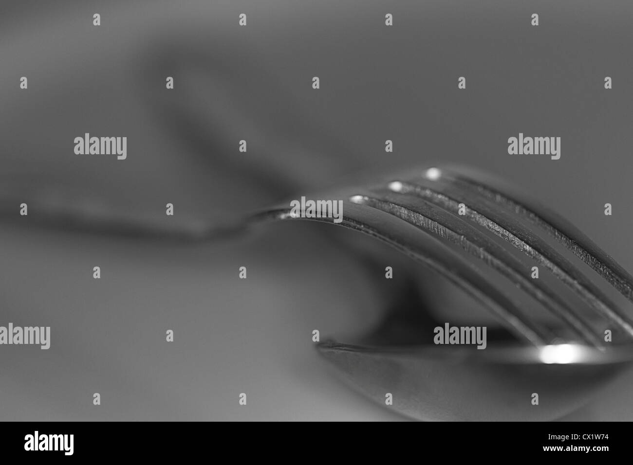 fork over a spoon Stock Photo Alamy