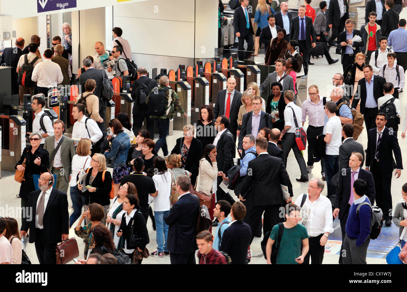 Waterloo Station commuters and ticket barriers Stock Photo