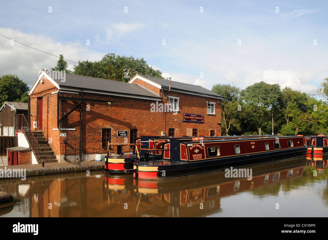 One of the bases of Black Prince Holidays, on the Worcester and Birmingham Canal at Stoke Prior, Worcestershire, England Stock Photo