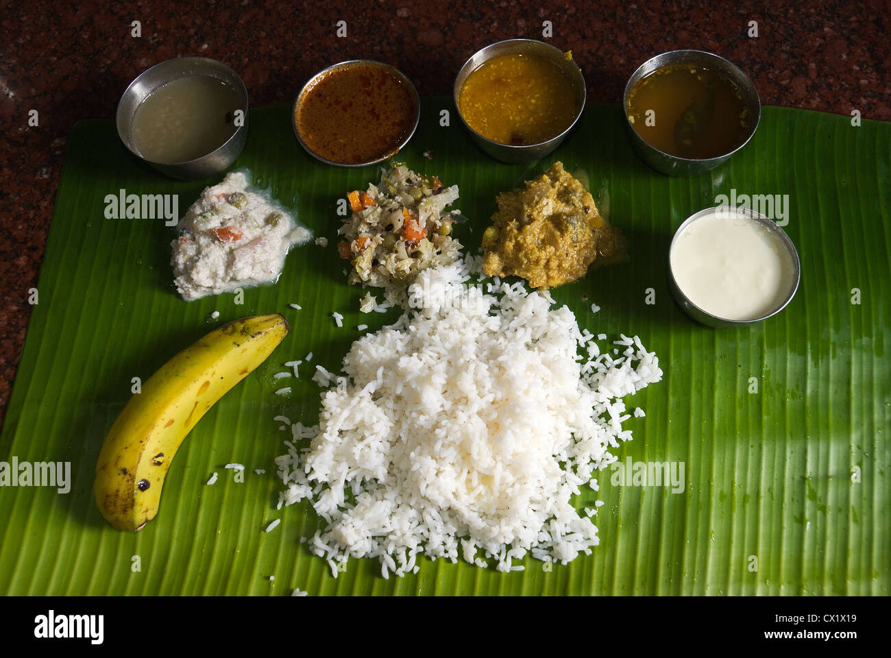 Elk201-4087 India, Tamil Nadu, Chennai, S India thali meal served on banana leaf Stock Photo