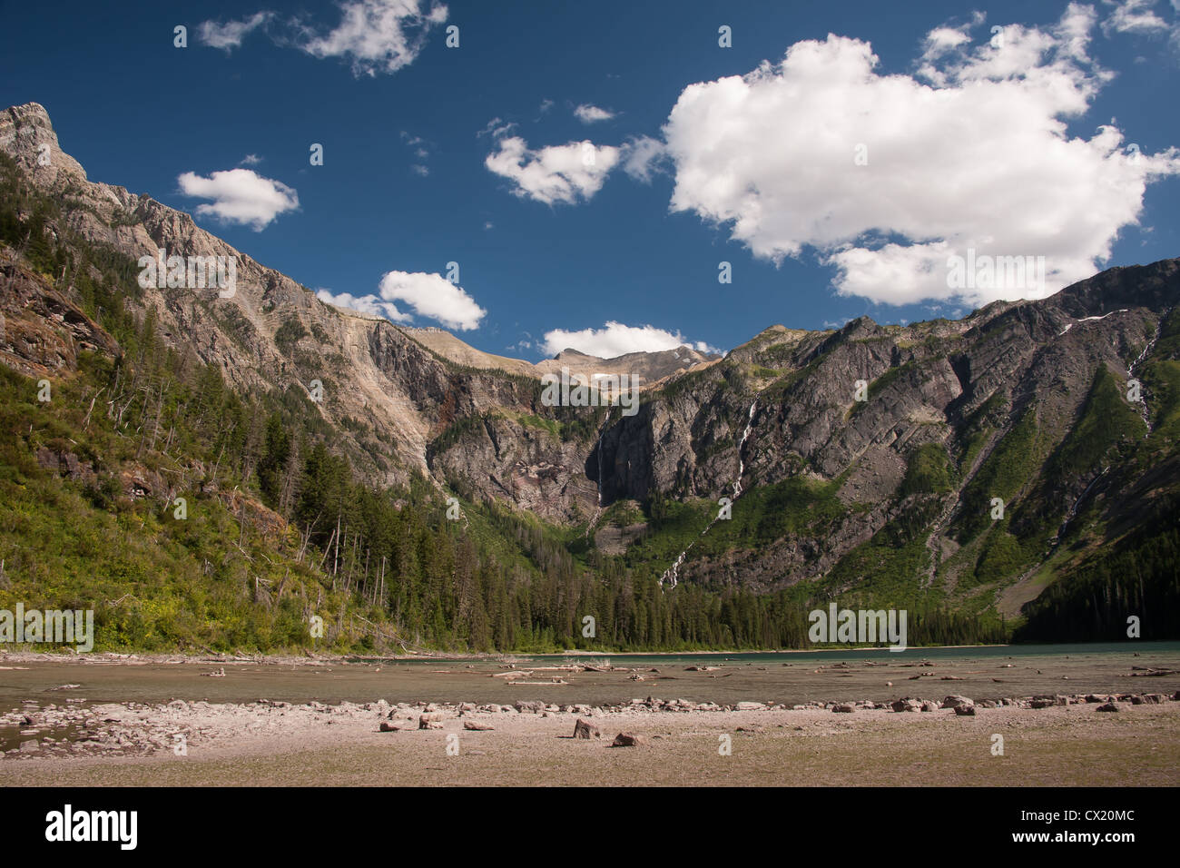 Summer clouds over Avalanche Lake in Glacier National Park, Montana. Stock Photo