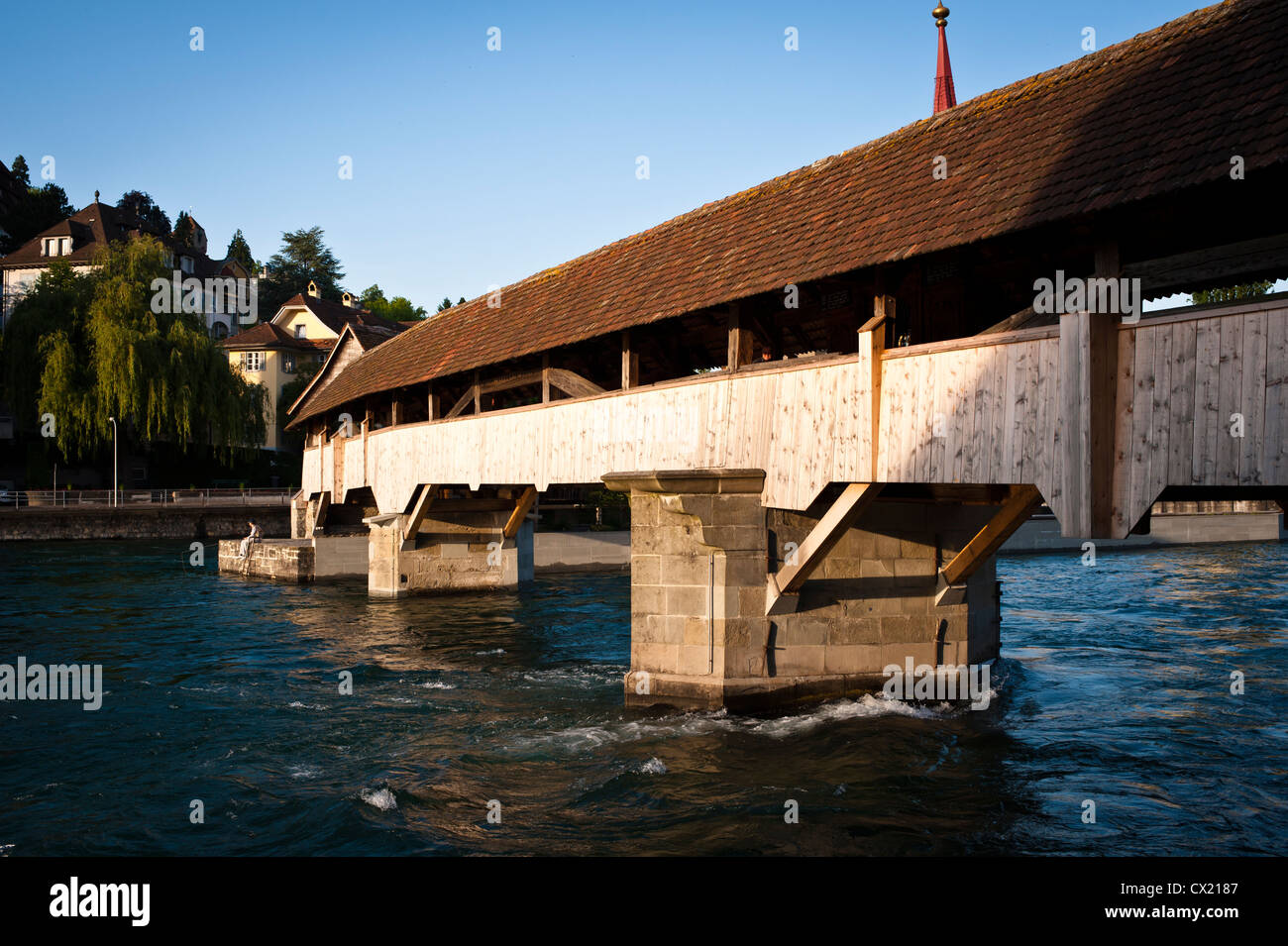 View of Lucerne's covered bridge over the Reuss River Stock Photo
