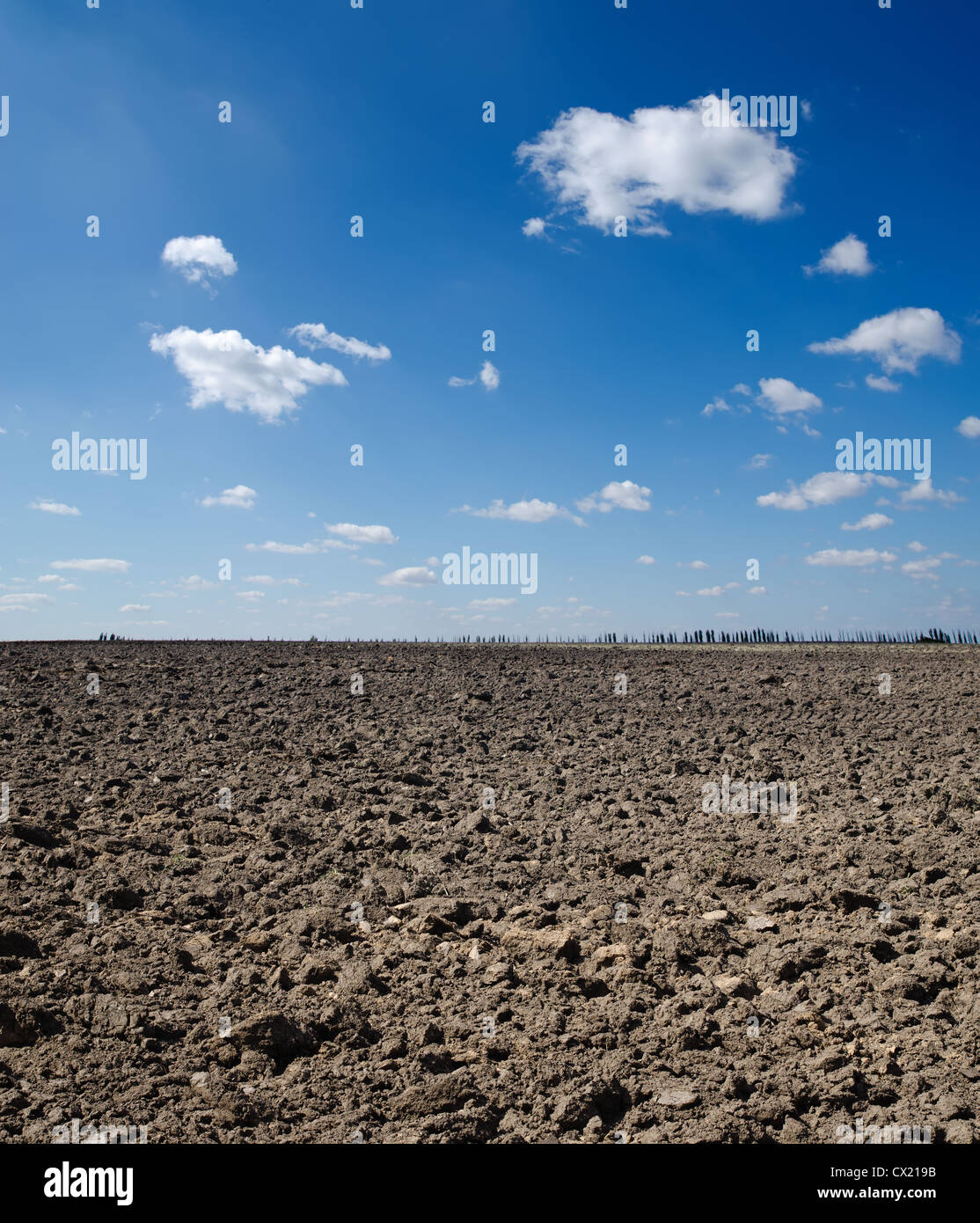 black field under deep blue sky Stock Photo - Alamy