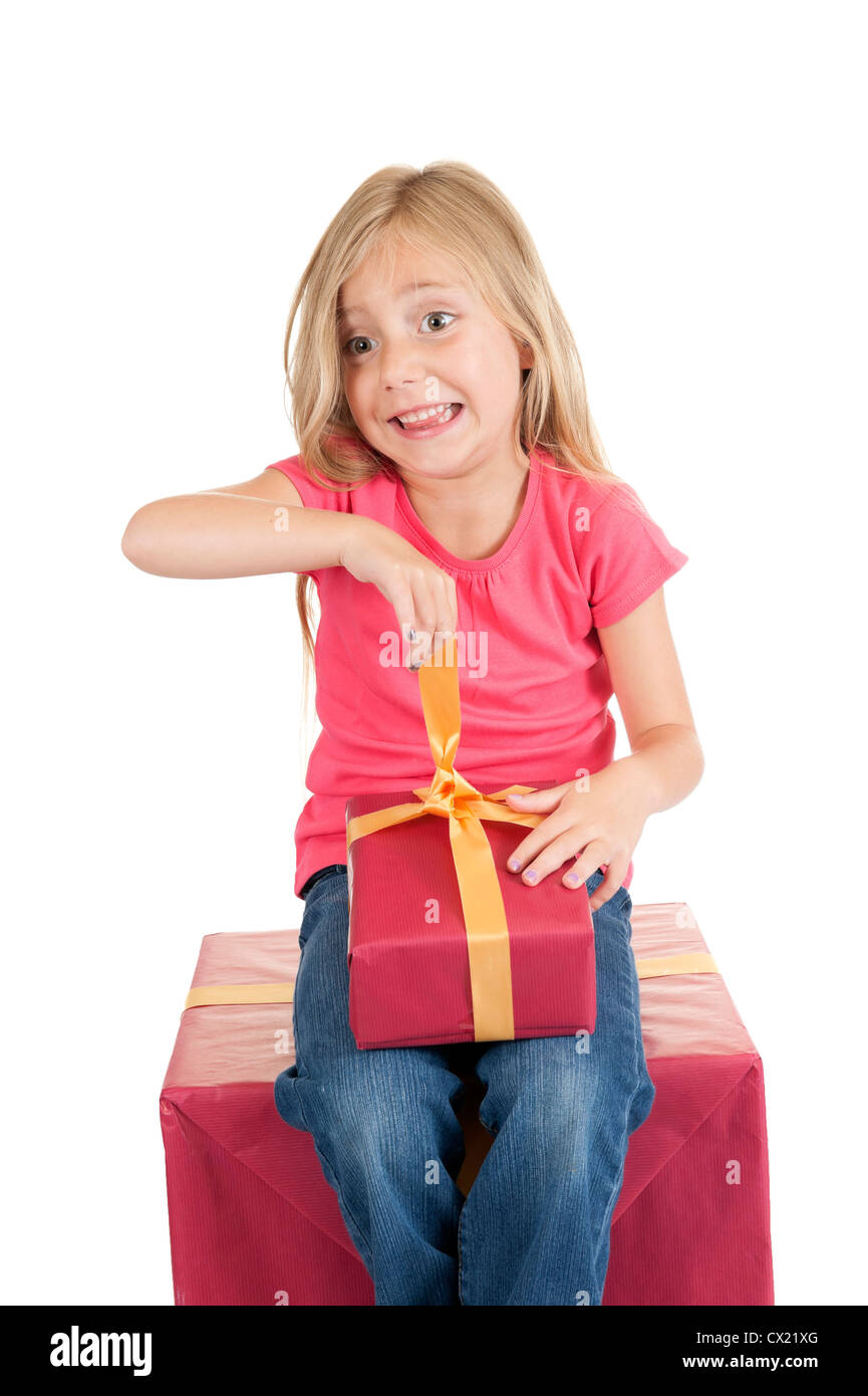 little girl with birthday presents, isolated on white background Stock Photo