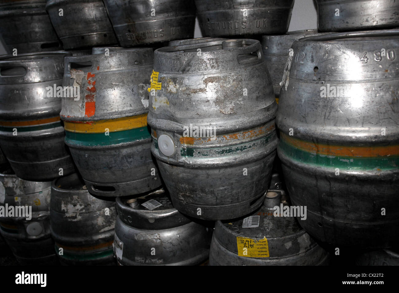 Stack of empty beer barrels outside a pub in Brighton, East Sussex, UK