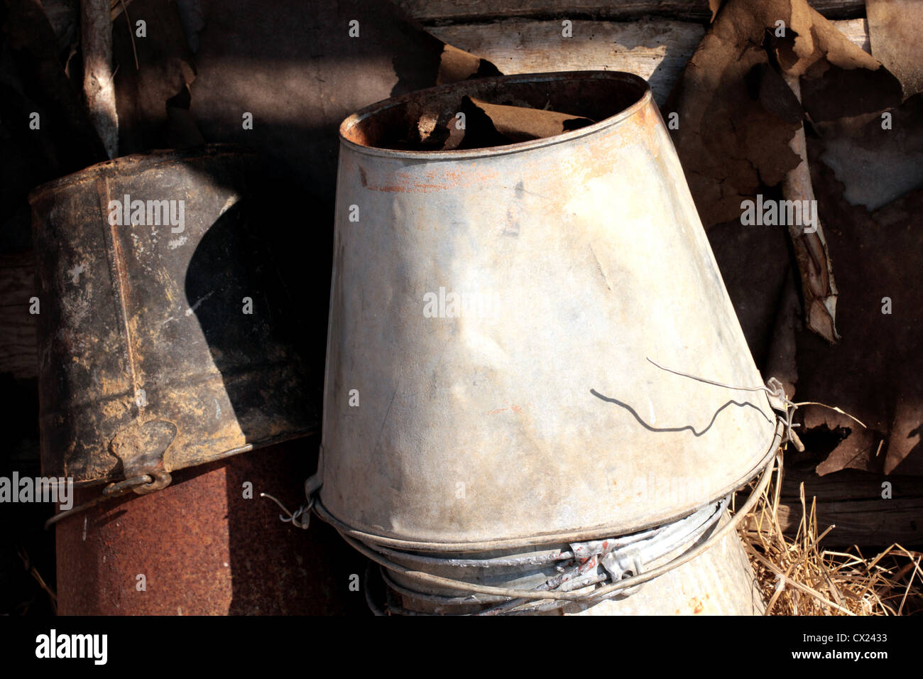 old rusty buckets at their summer cottage Stock Photo Alamy
